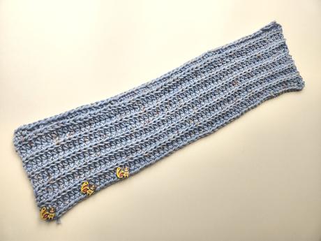 Pletená šála na obrázkové knoflíky,