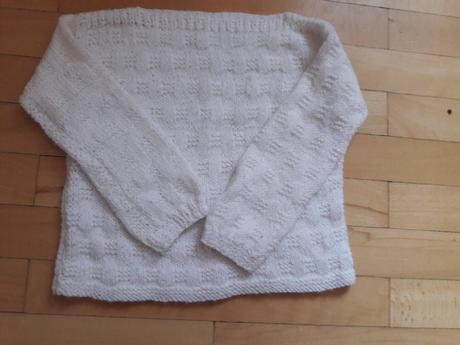 Kojenecký svetr, 74