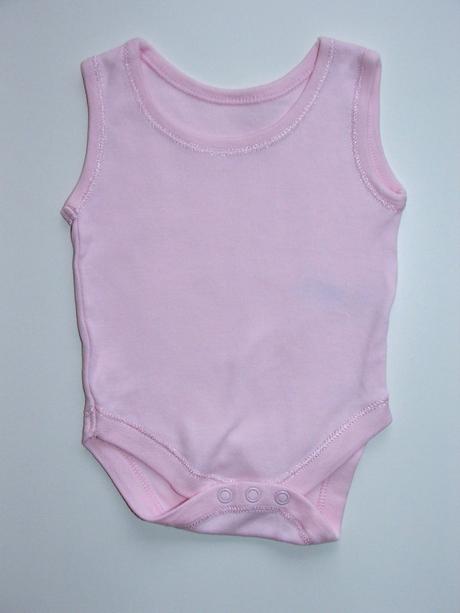 C423 růžové body tílko vel. 50, nutmeg,50