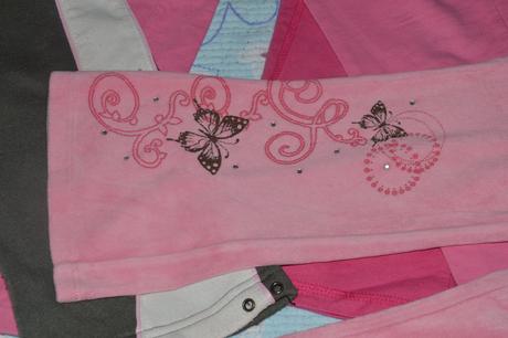 Růžové plyšové tepláky s motýlky a kamínky, 116