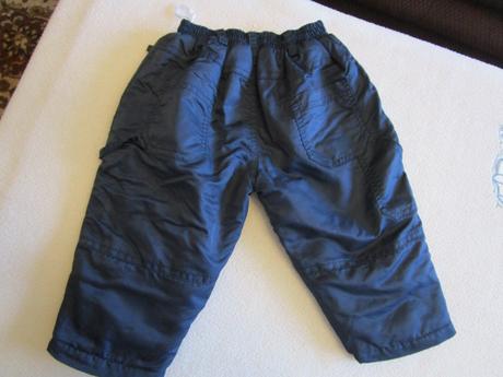 Pěkné tm. modré oteplené šusťákové kalhoty, v.80, dimo,80