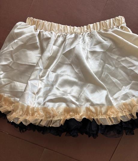 An3/ sukně zlaté šampaňské barvy- v.cca 5/8 let, 122