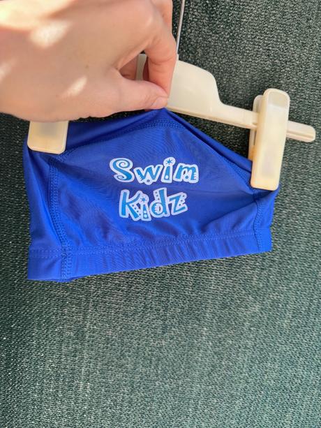 Koupaci čepice, 116