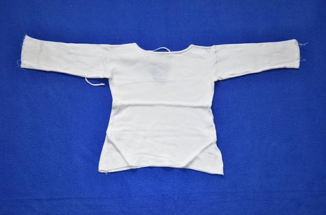 Kojenecká košilka, 56