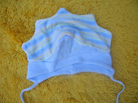 Sametová čepice, 56