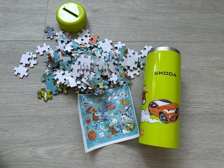 Puzzle škoda v plechové tubě,
