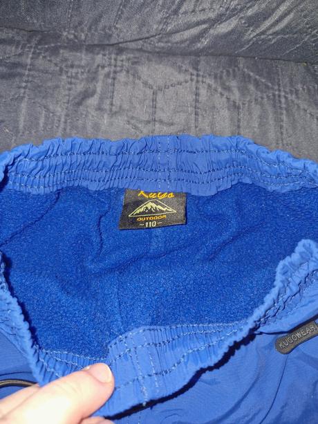 Zimní modré zateplené kalhoty zn. kugo vel. 110, kugo,110