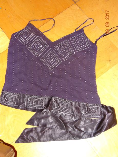 Slavnostní tílko, 158