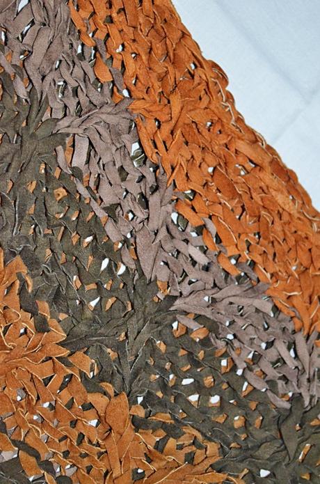 Vesta pletená z kůže, l