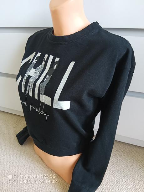 Crop top mikina zn."destination" vel."146-152", 146