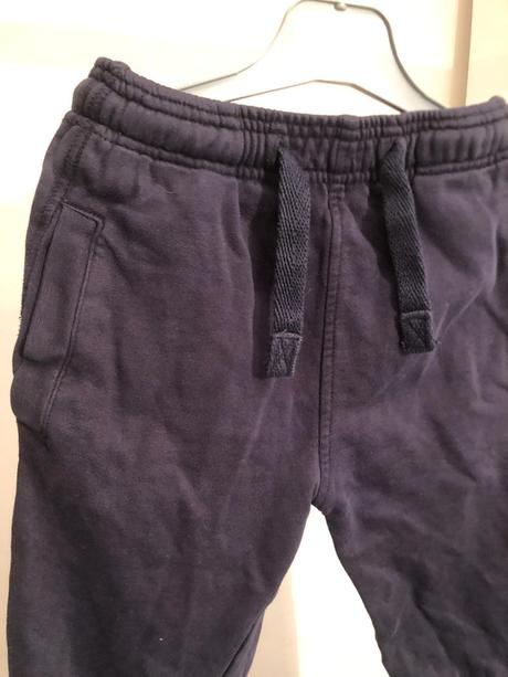 Modré tepláky s kapsami a tkanicí, 116