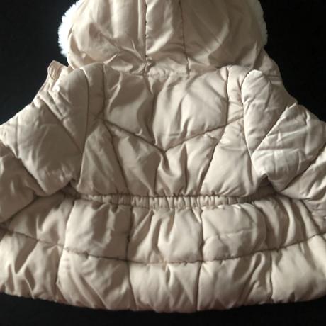 Světlá zimní bunda, 86