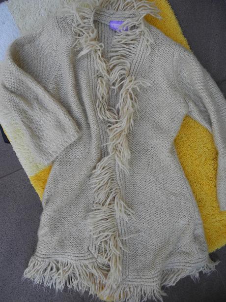 Svetr s třásněmi, 122