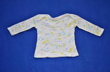 Kojenecká košilka, 56