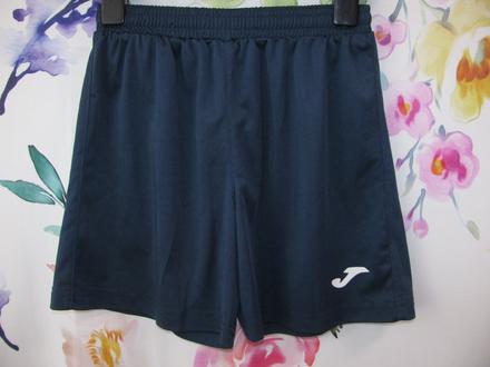 Chlapecké modré elastické šortky joma, 140