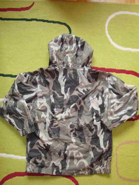 Šusťáková bunda-pláštěnka, 122