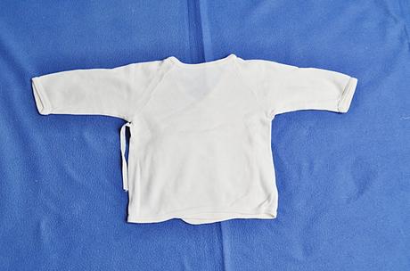 Kojenecká košilka, 56