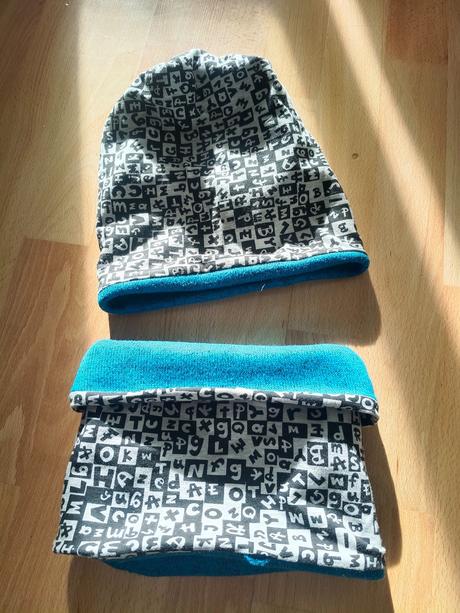 Čepice a nákrčník, 128