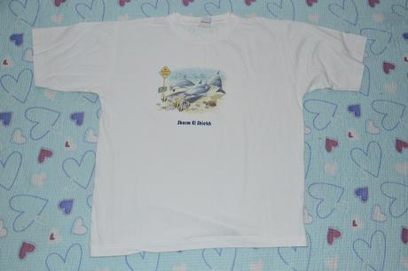 Bílé triko s delfíny, 158