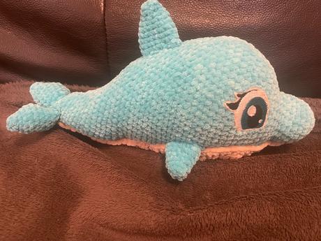 Háčkovaný delfin,