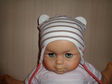 Pruhovaná čepice s ošuky., 62