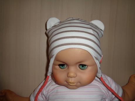 Pruhovaná čepice s ošuky., 62