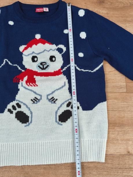 Svetr s ledním medvědem, 122