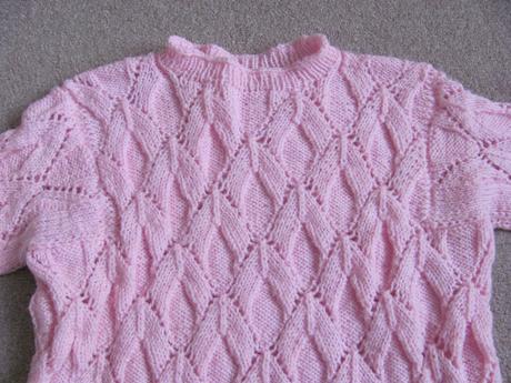 Růžový svetr, 110