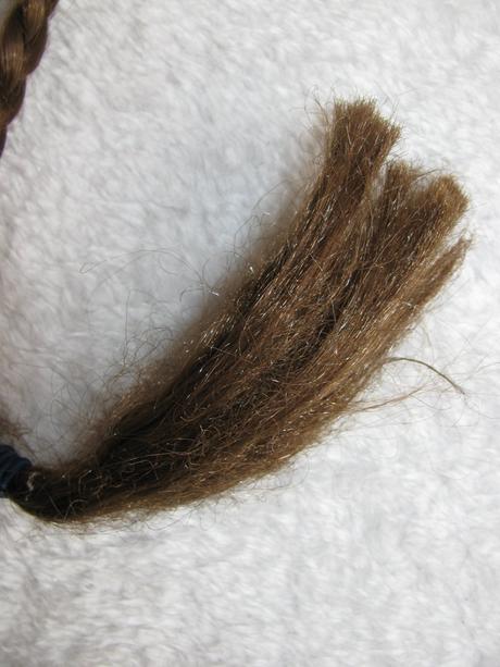 Čelenka s copem a kytičkami, 