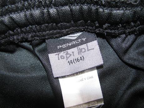 Černé nenošené tréninkové tepláky penalty, 164