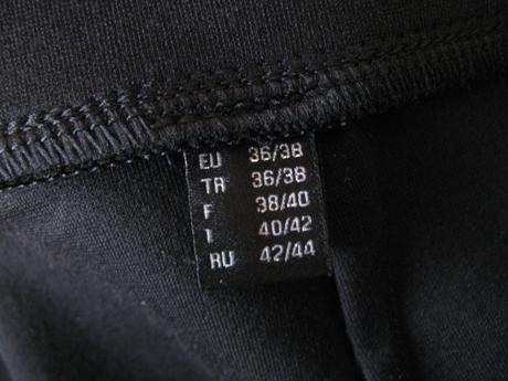 Černé koženkové kalhoty s pružným pasem, tchibo,38