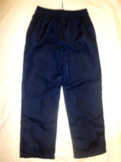 Luxusní tmavomodré sportovní kalhoty, 140