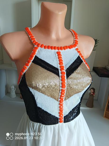 Šaty zn."xenia boutique" vel."8",