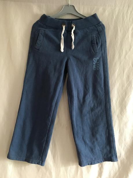 Vel. 122 šedomodré tepláky s kapsami, 122