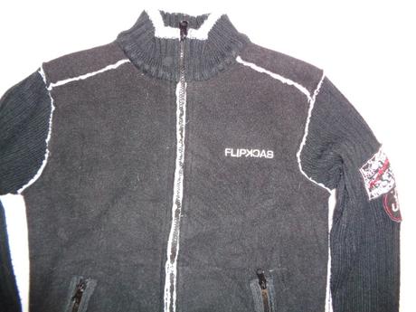 Luxusní černá bunda vyteplená kožíškem, 140