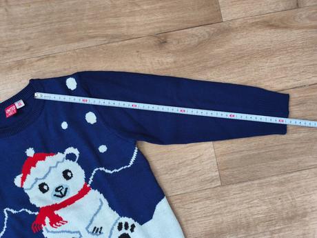 Svetr s ledním medvědem, 122