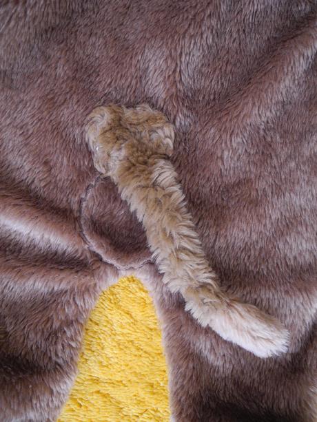 Kombinéza medvěd, 62