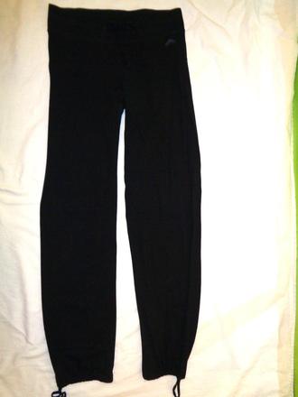 Černé slabší elastické tepláky, h&m,164