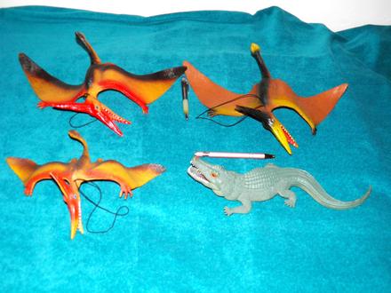 Sbírka dinosaurů, krokodýl a ptakoještěr,