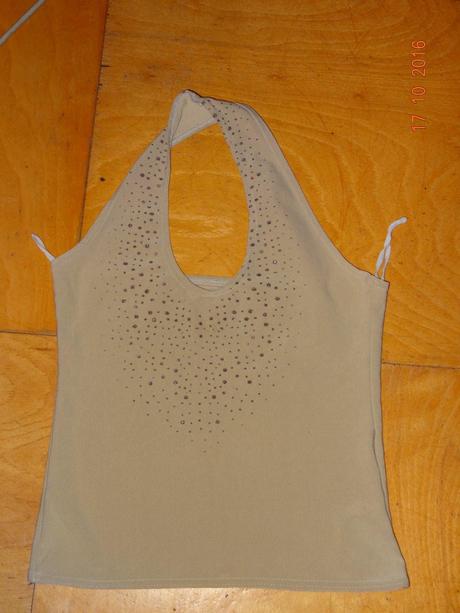 Dívčí tílko, 122