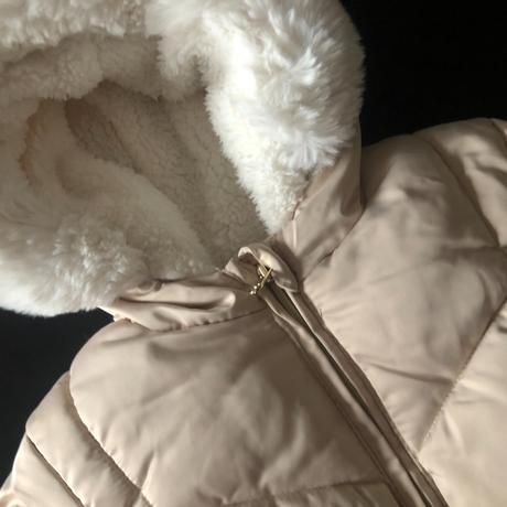 Světlá zimní bunda, 86