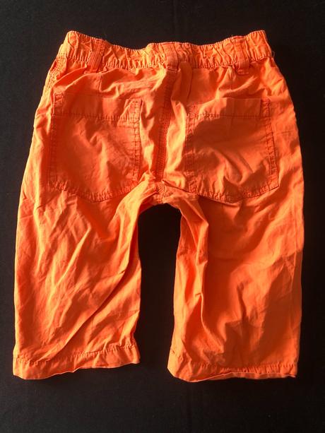 Vel. 110 oranžové plátěné 3/4 kalhoty, 110
