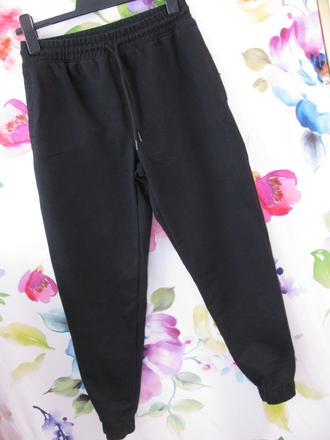 Černé bavlněné tepláky - unisex, decathlon,l