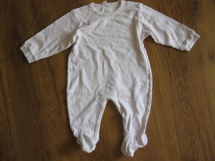 Světle růžový overal, 68