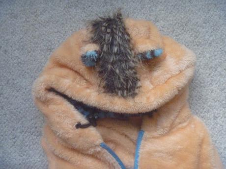 Oranžová chlupatková vesta vel. 134/140, 134