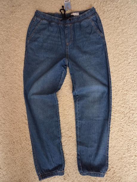 Nenošené světlejší pánské džíny "jogger", 52