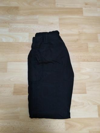 Černé šusťákové kalhoty vel.146, 146