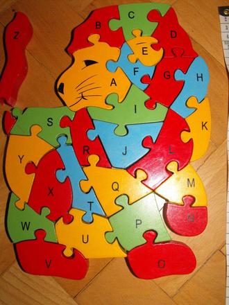 Dřevěný puzzle lev,