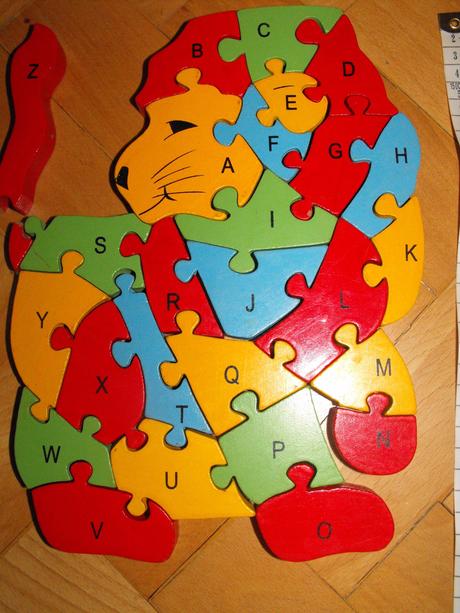 Dřevěný puzzle lev,