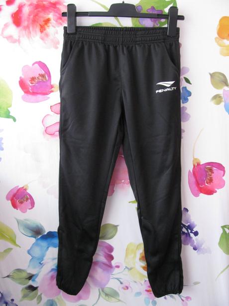 Černé nenošené tréninkové tepláky penalty, 164